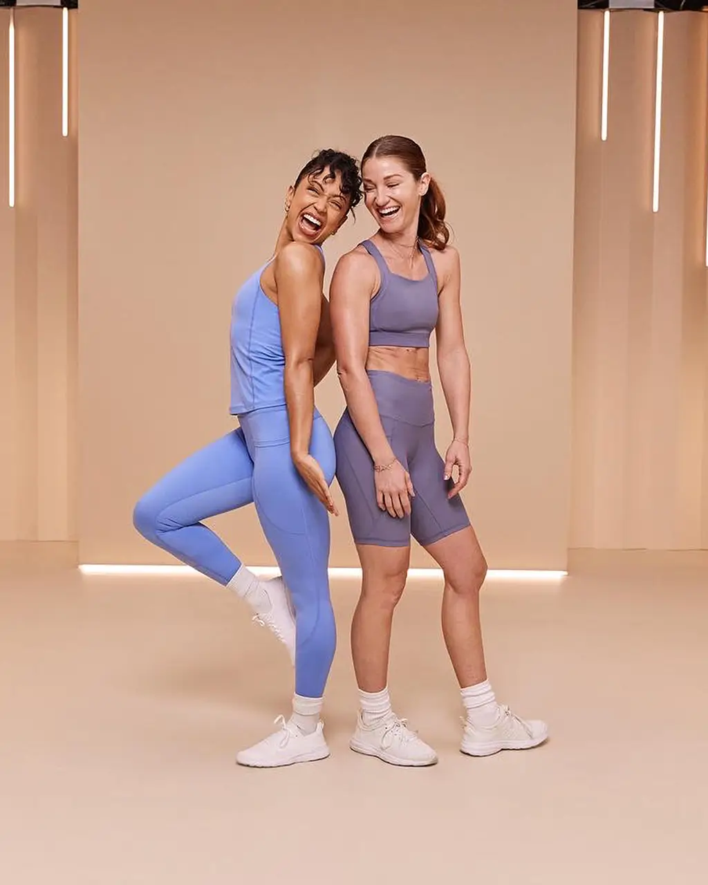Jenna Willis posing with celebrity inside a fitness studio